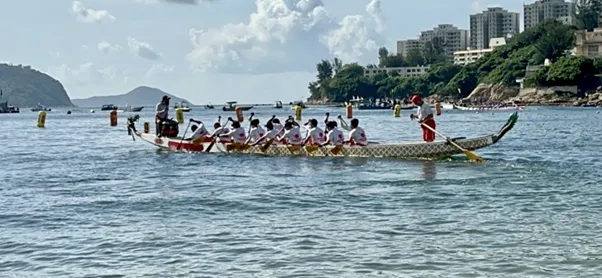 The Dragon Boat Festival - People Rowing