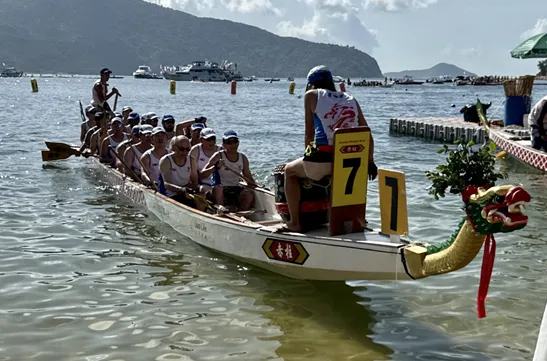 The Dragon Boat Festival - People Rowing